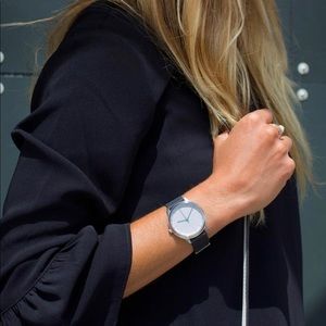 black waterproof stainless steel white face minimalist dial silicone band